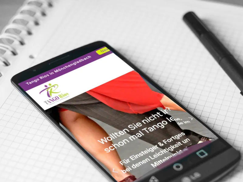 Termine - Block, Stift und eine Smartphone mit der Startseite von Tango-Rios